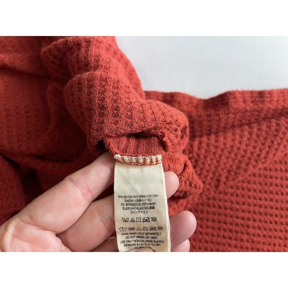 Free People Ventura Thermal Top in a Orange red waffle knit high-low hem Medium
